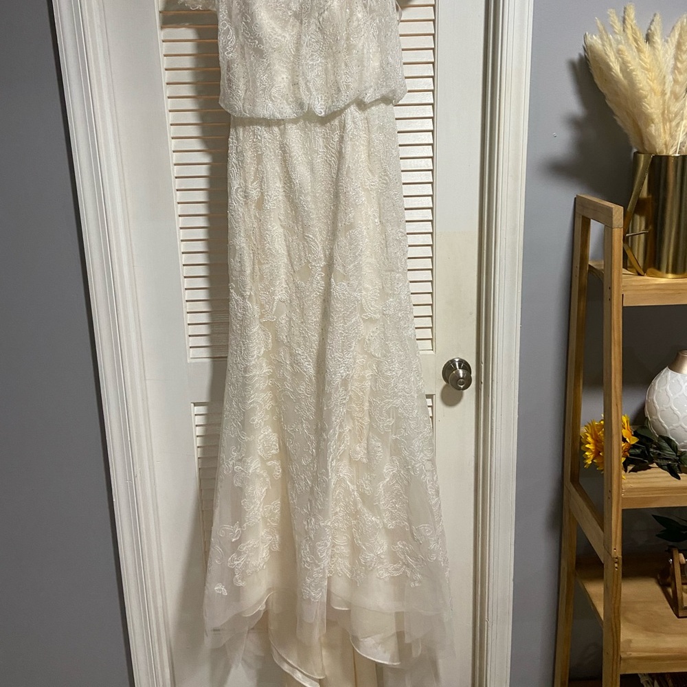 Size 8 David’s bridal dress. Unaltered- silk slip under the top layer